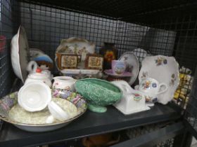 Cage containing Crested ware butter dishes, transfer printed bowl, various crockery and china
