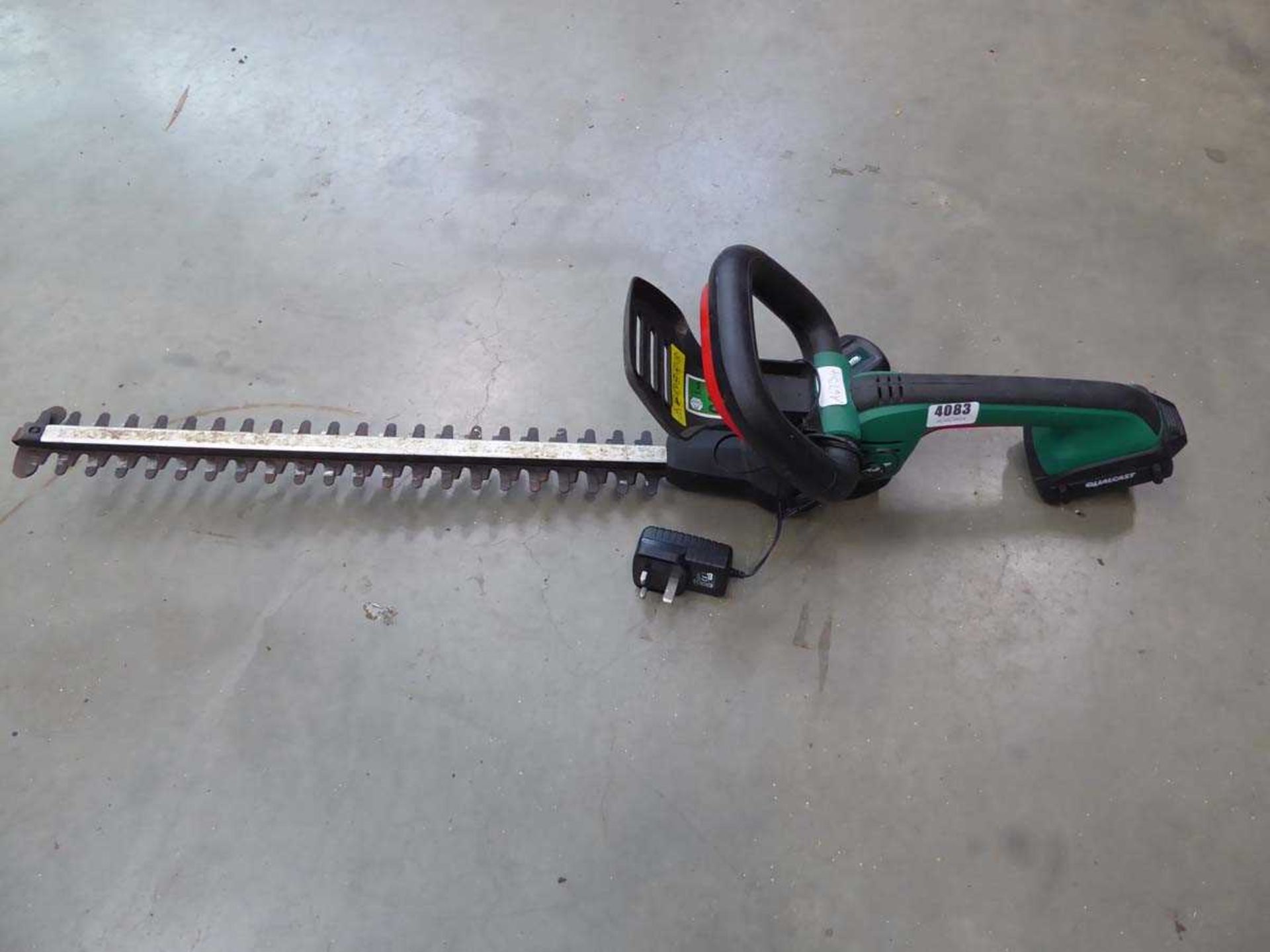Qualcast battery powered hedge cutter with battery and charger