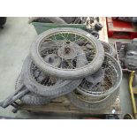 Pallet of vintage motorcycle wheels