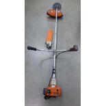 Stihl double handled petrol powered brush cutter with chainsaw attachment