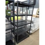 Two black plastic racks