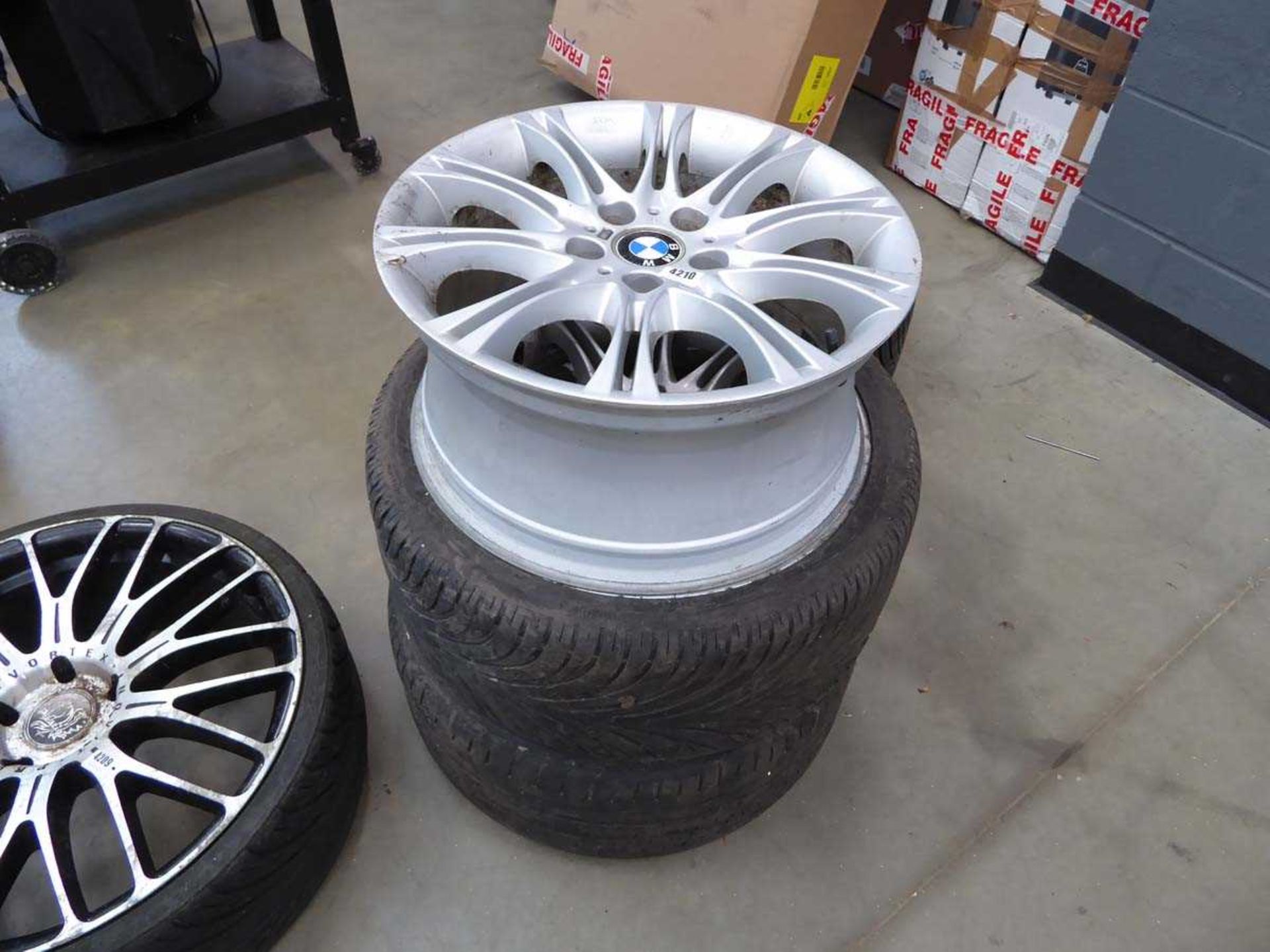 3 BMW alloy wheels with 2 tyres