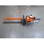 Stihl small petrol powered hedge cutter