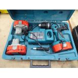 Makita battery drill with three batteries and charger