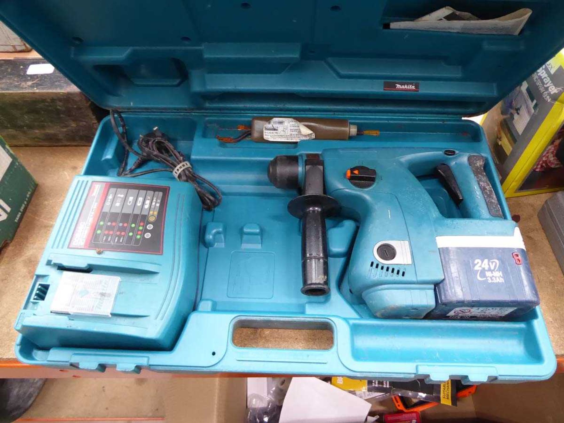 Makita 24V STS drill with one battery and one charger