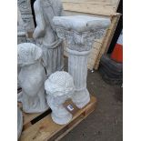 Concrete Roman bust with small concrete pillar