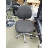 Grey cloth swivel armchair