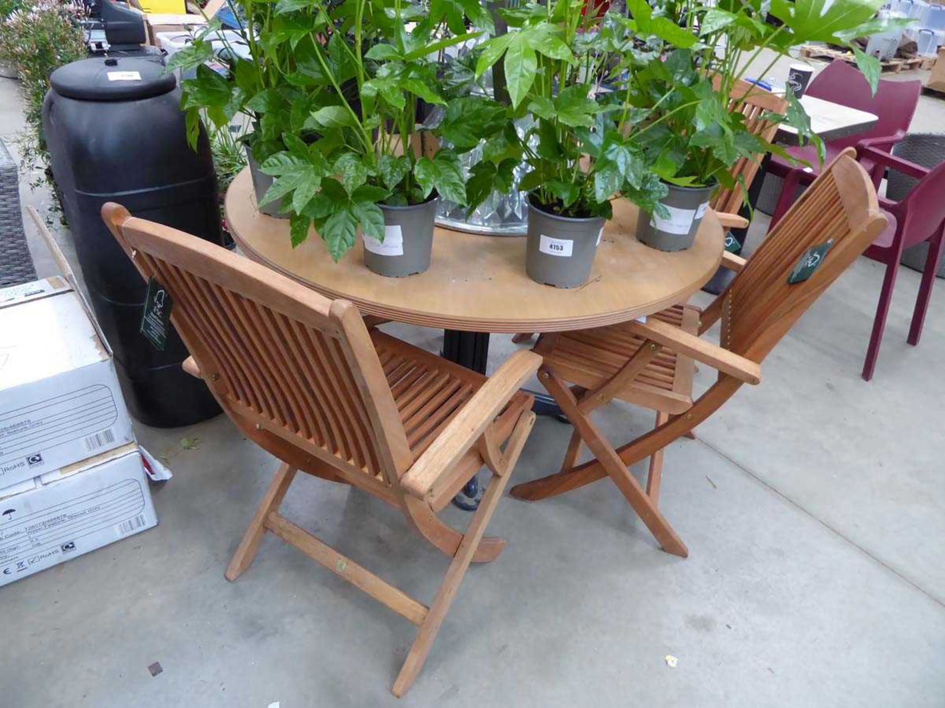 Round wooden garden table, and 4 wooden fold up garden chairs