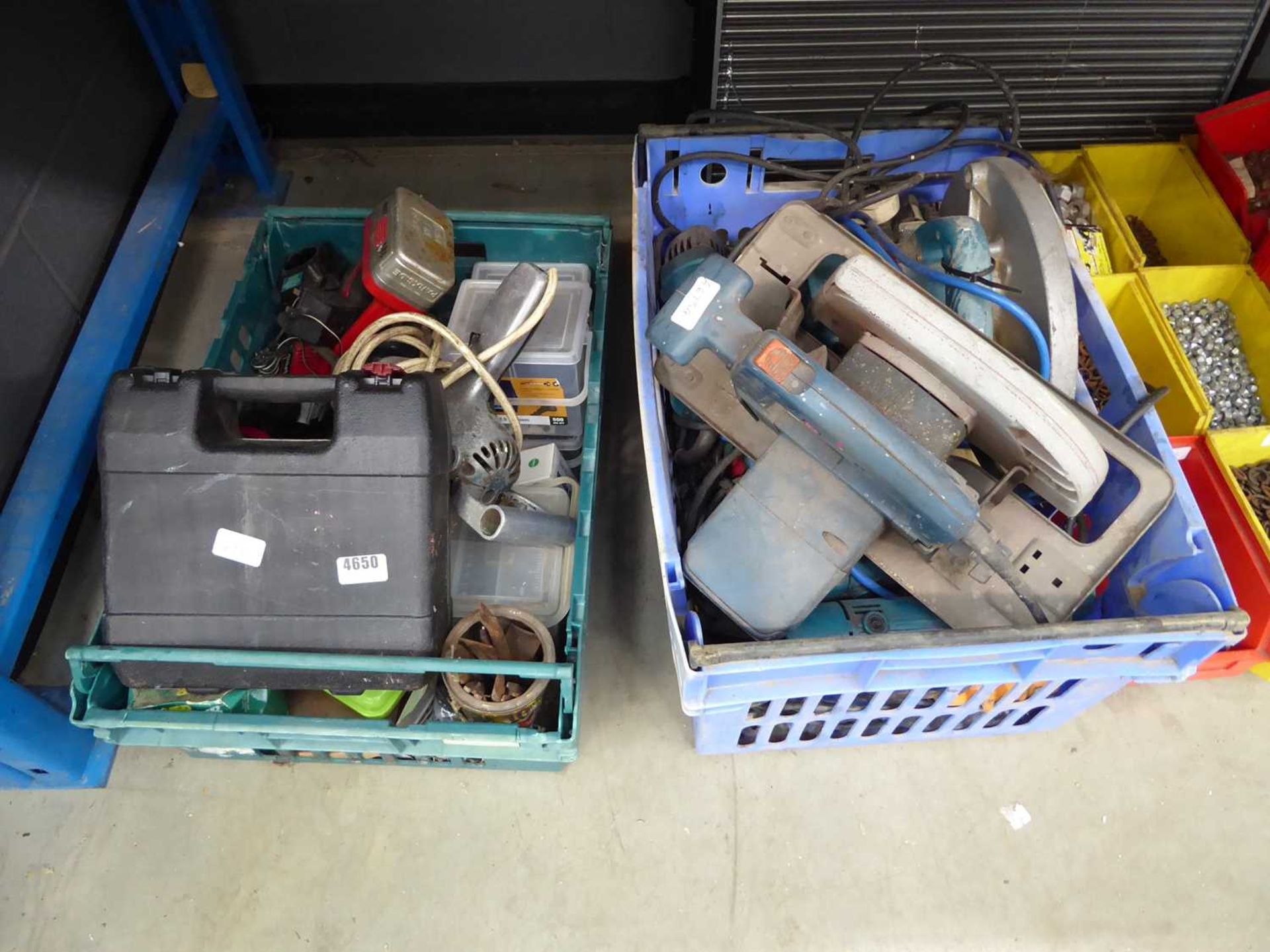 2 x boxes containing various tools including circular saws, drills, hot air guns, etc