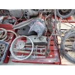 Pallet containing vintage motorcycle parts including forks, frame, fuel tank, wheel, etc