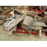 Pallet containing vintage motorcycle frame, spare parts, including wheels and covers
