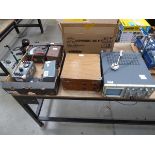 Oscilloscope, loop tester and box of various other testers