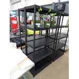 Two black plastic racks