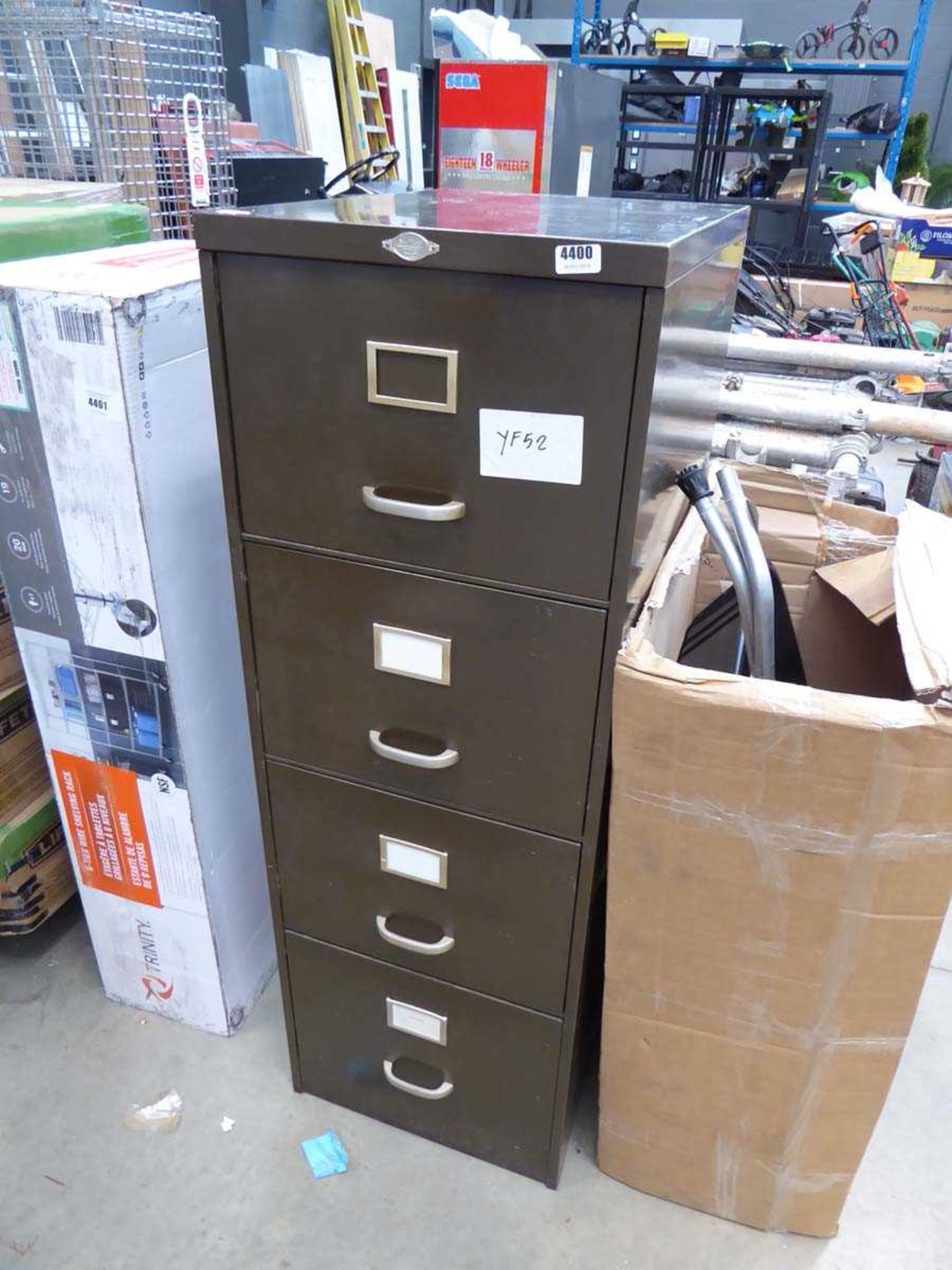 Brown metal 4 drawer filing cabinet