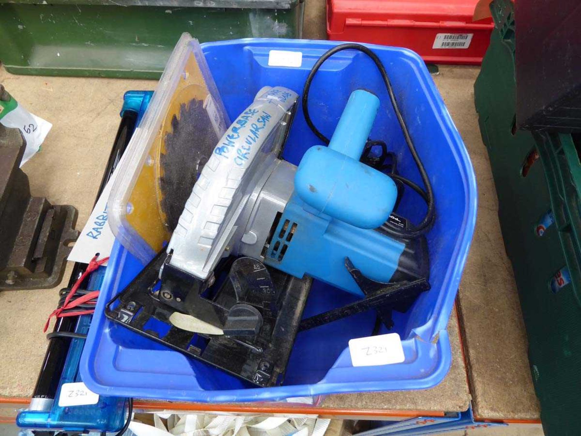 Box containing PowerBase circular saw and blade