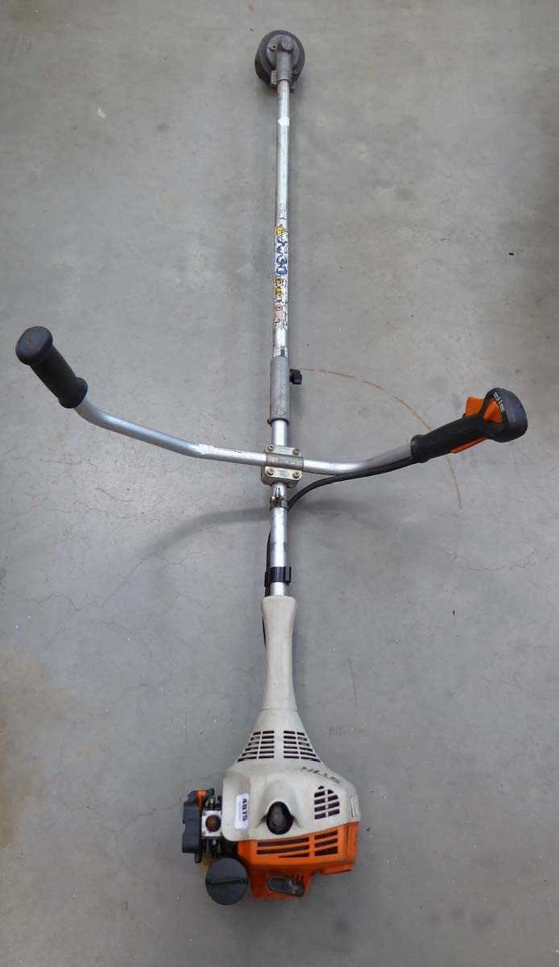 Stihl petrol powered double handed strimmer