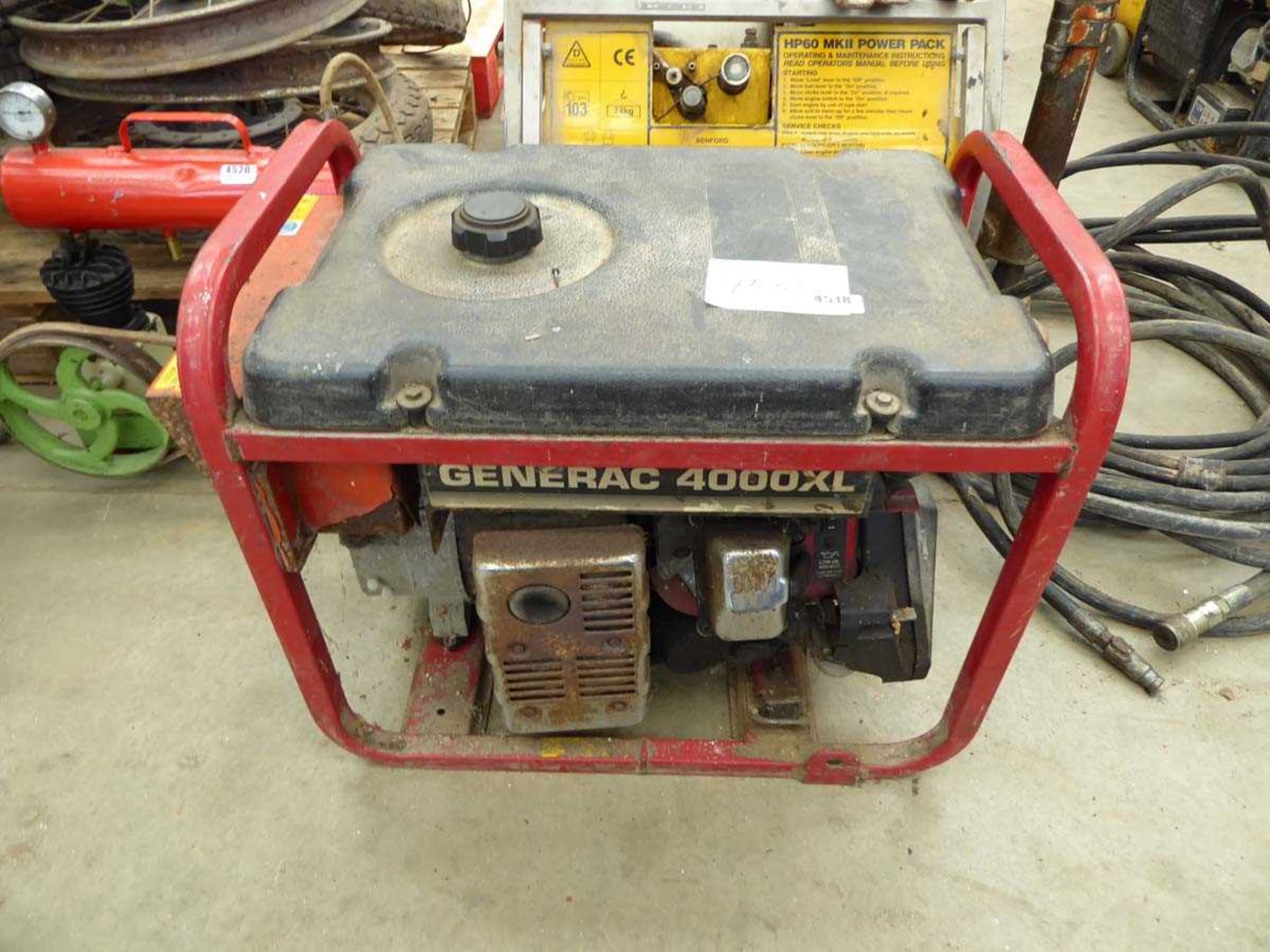 Red petrol powered generator