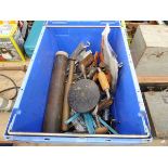 Blue plastic crate containing hacksaw blades, tools, wire, etc