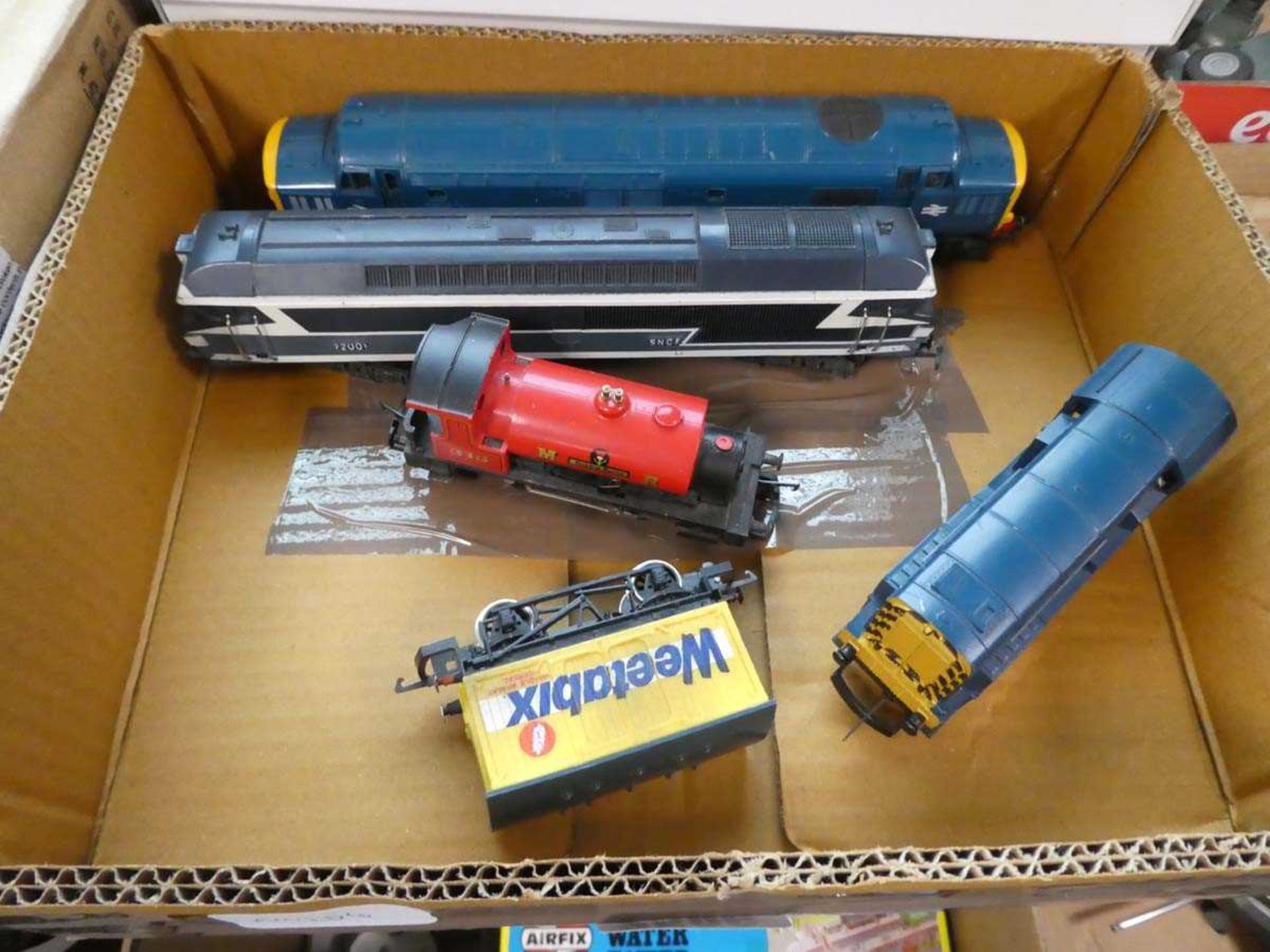 Box containing model trains and 1 carriage
