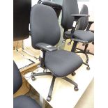 Black cloth operators swivel armchair on black base