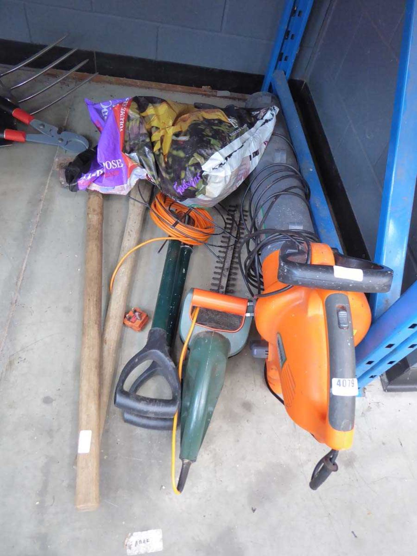 Qty of garden tools to include blow vac, pick axe, sledge hammers, forks, spades, etc