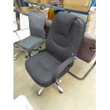 High backed office swivel armchair in black cloth on chrome base