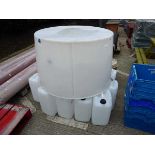 Qty of plastic storage barrels and a large white moulded plastic tank