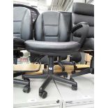 Black office operators chair on black base