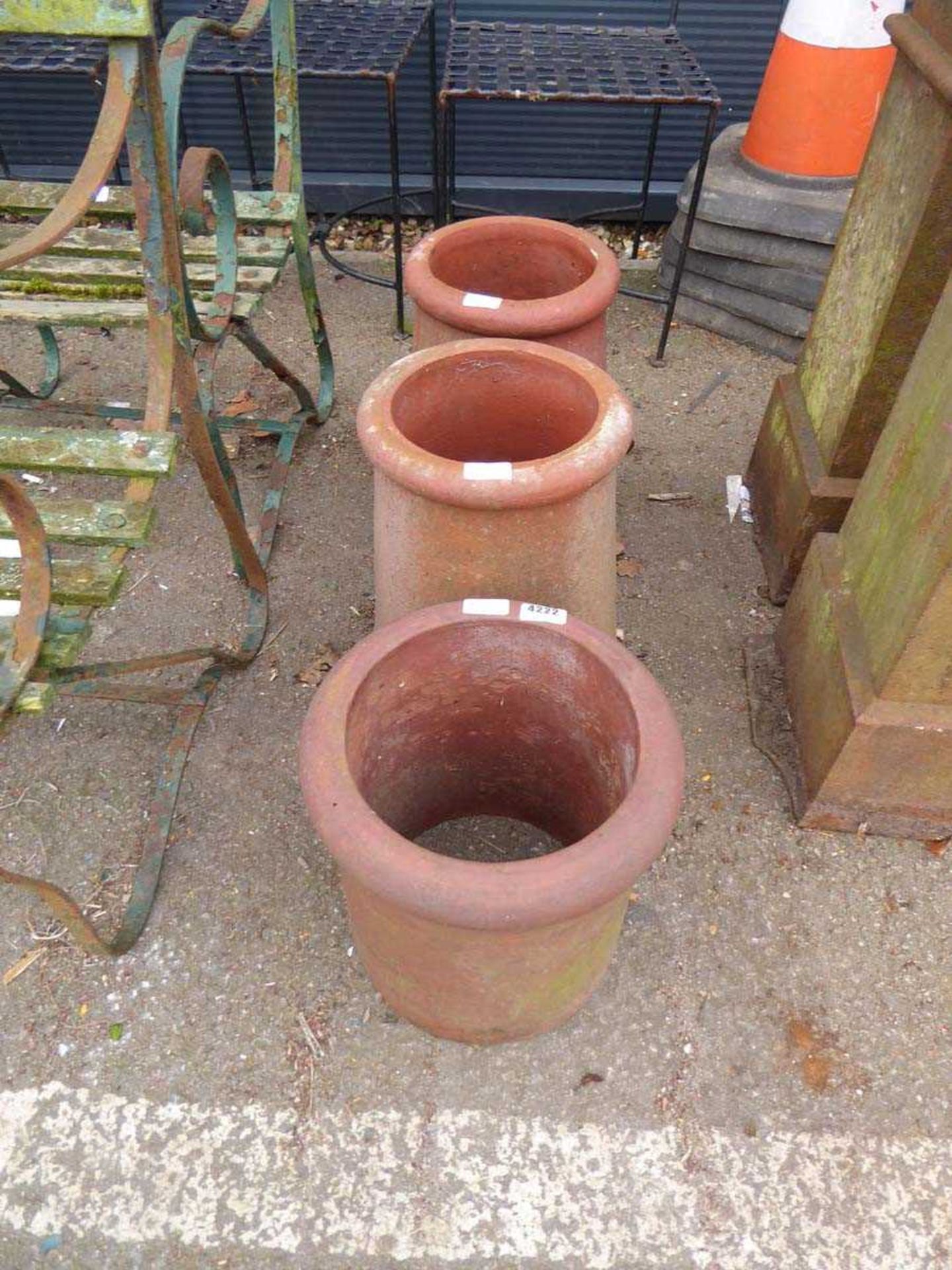 3 small terracotta chimney pots