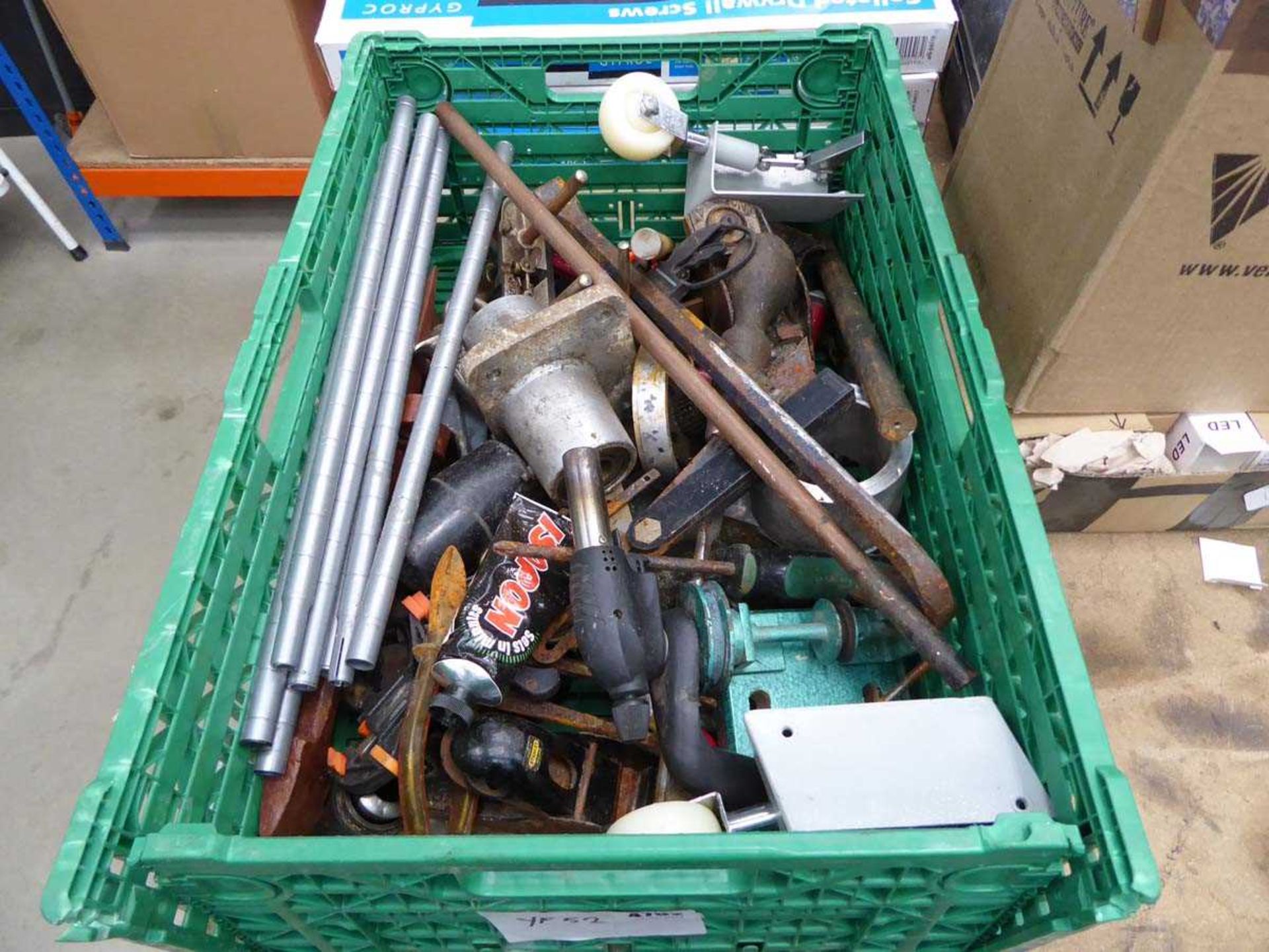Green crate of assorted tools to include plane bodies, hammers, clamps etc.