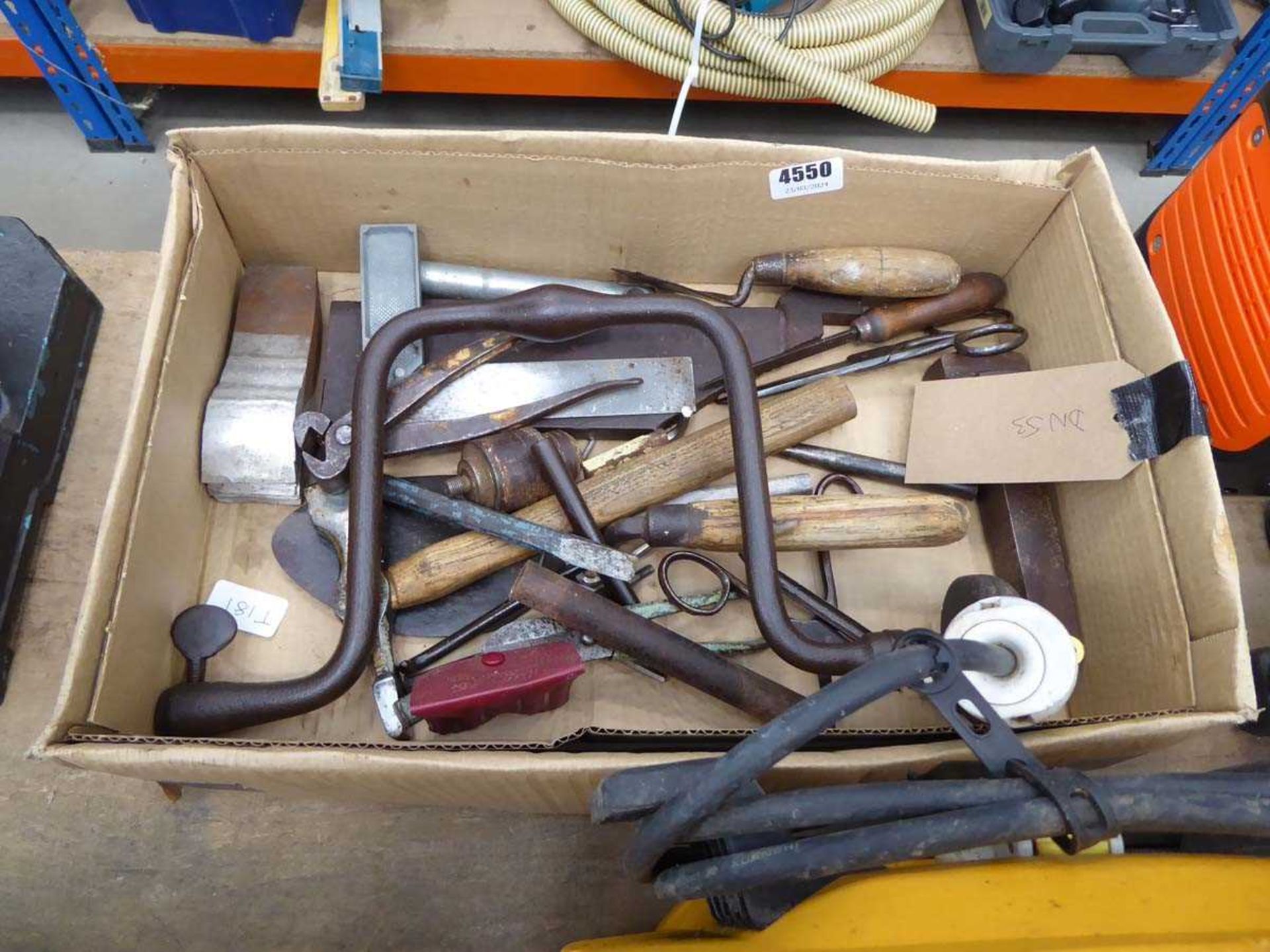 Box of assorted tools inc. hammers, trowels, etc.