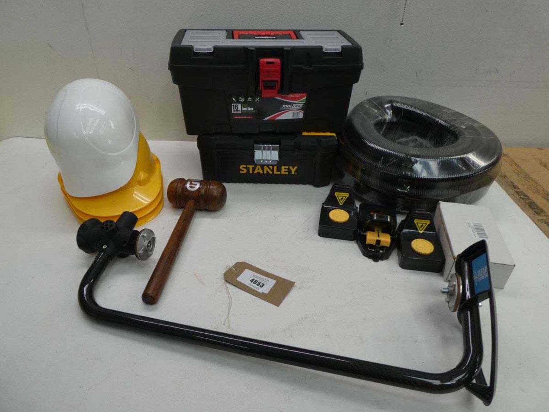 +VAT Wrap X 500 bracket, tool boxes, hard hats, mallet, mouse traps and hose