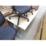 Electronic riser desk in light oak on grey base