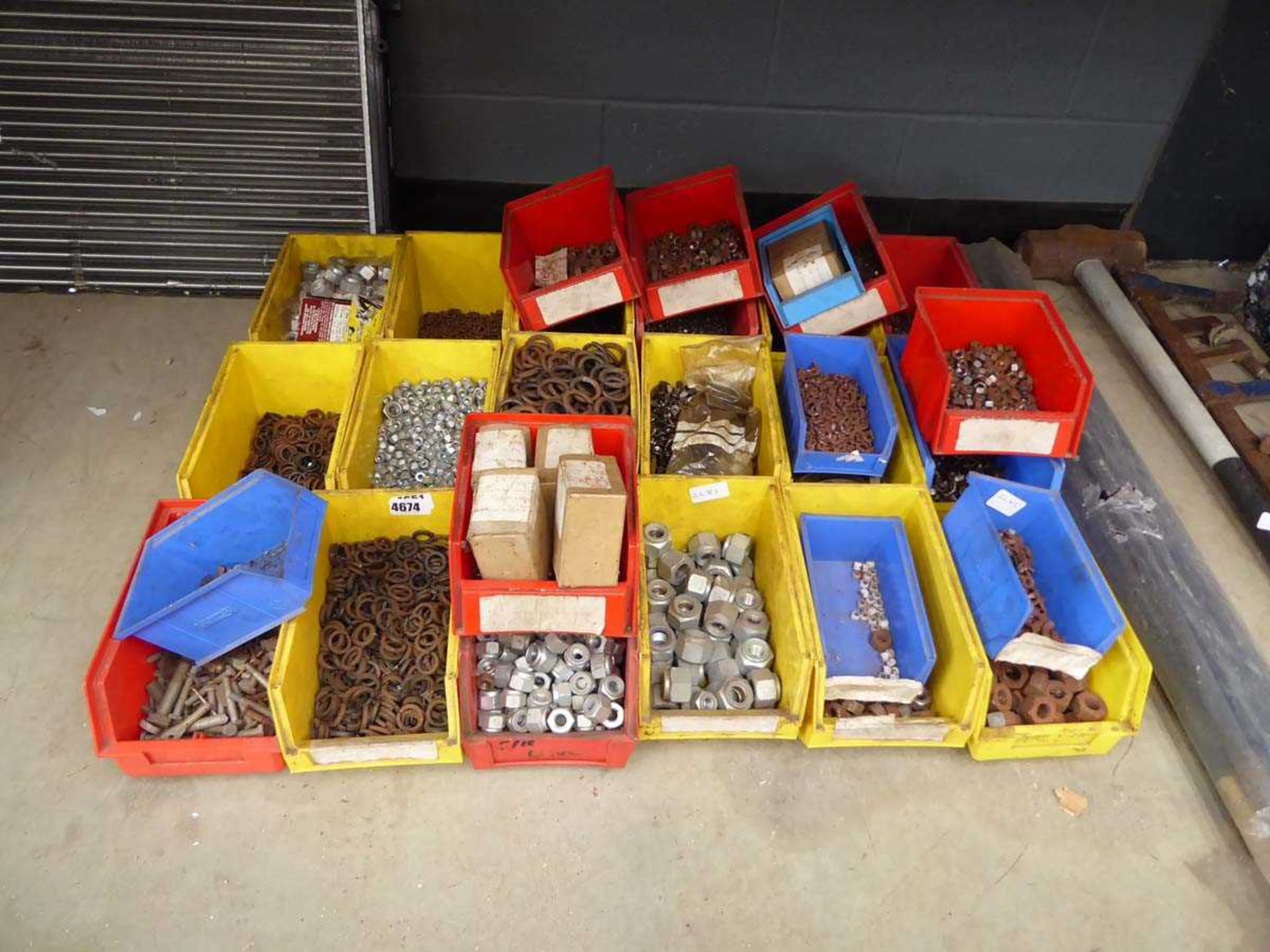 Quarter of a bay of assorted nuts, bolts, washers, etc