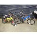 Four assorted bikes, to include child's yellow bike, blue BMX, Raleigh grey mountain bike, child's