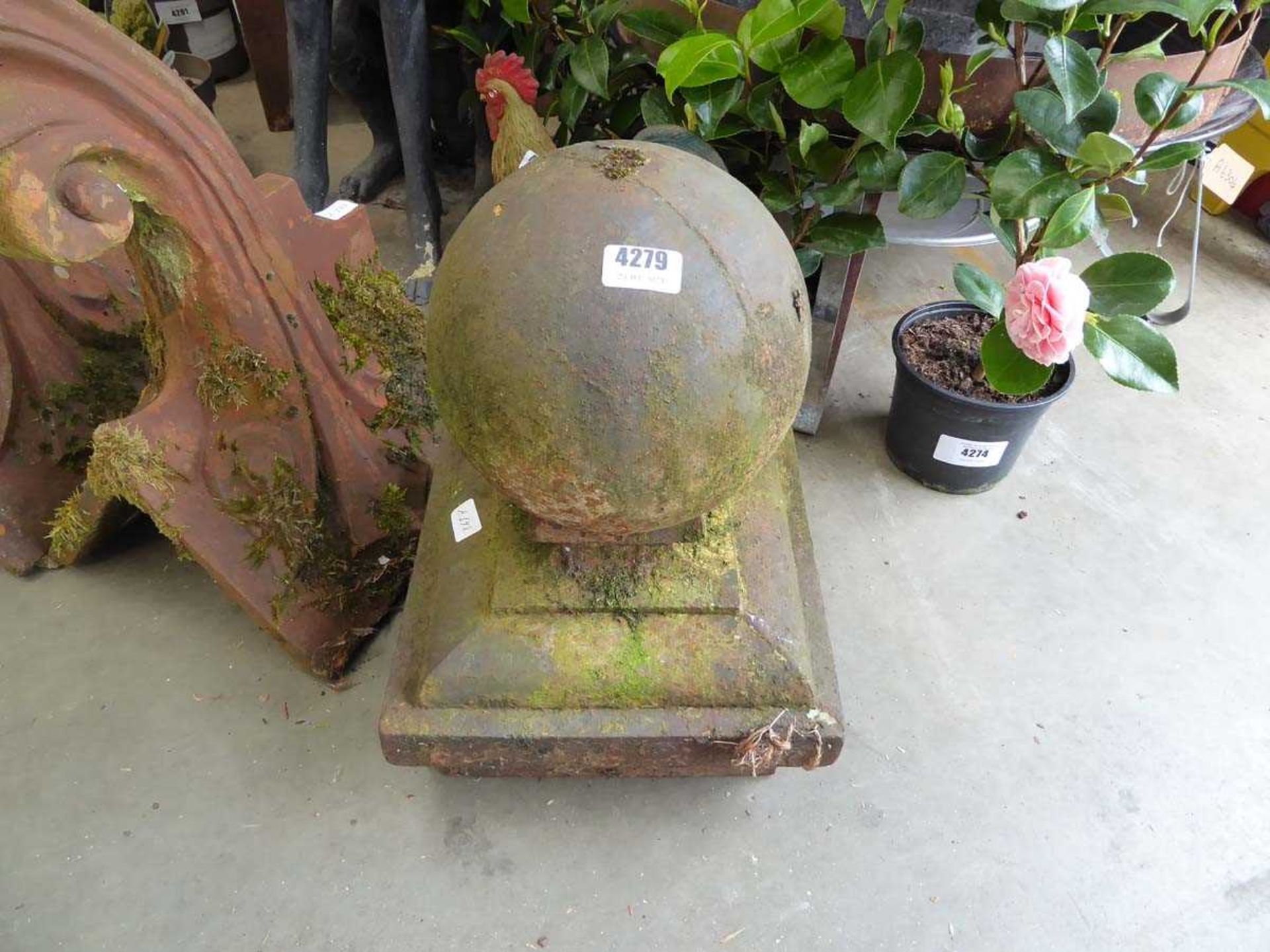 Cast metal post finial in shape of a ball