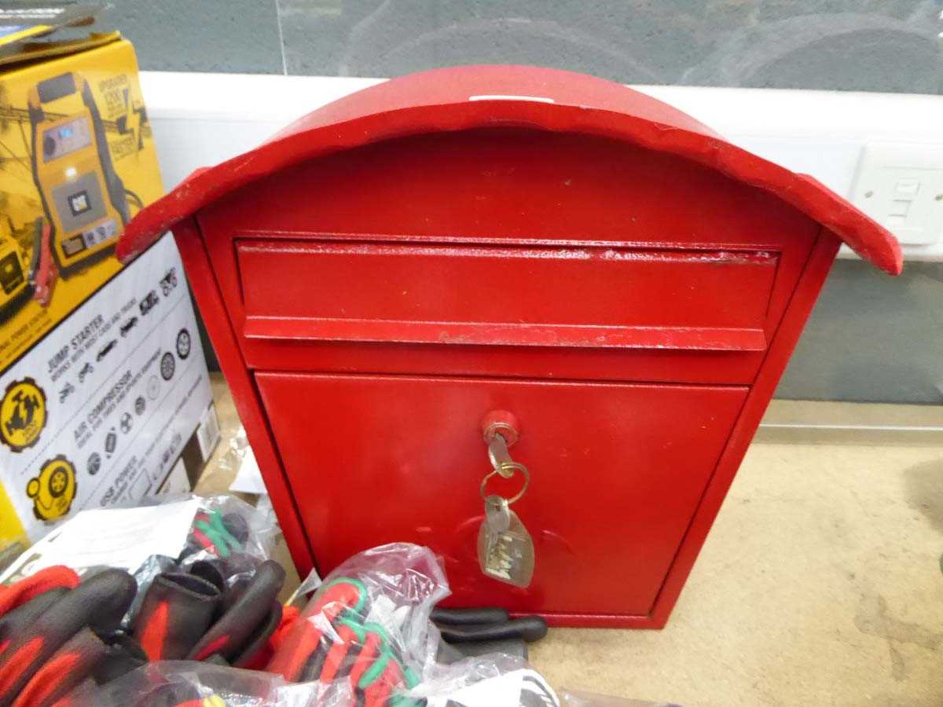 Red painted letter box