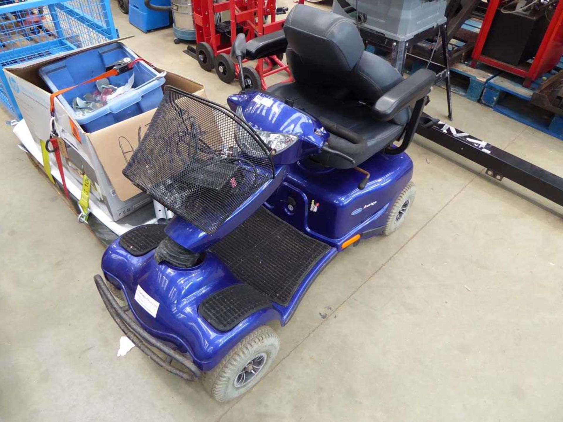 Invacare disability scooter in blue with charger