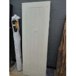 Two white multi panel internal doors Approx dimensions: height 199 cm, width 69 cm