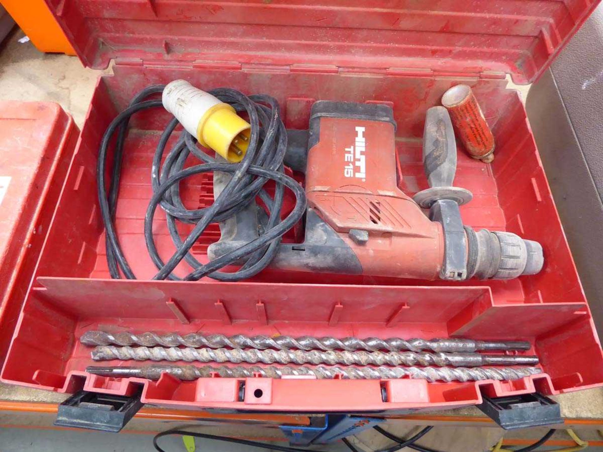 Hilti 110 SDS drill with drills in carry case