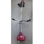 Sovereign petrol powered straight shaft strimmer