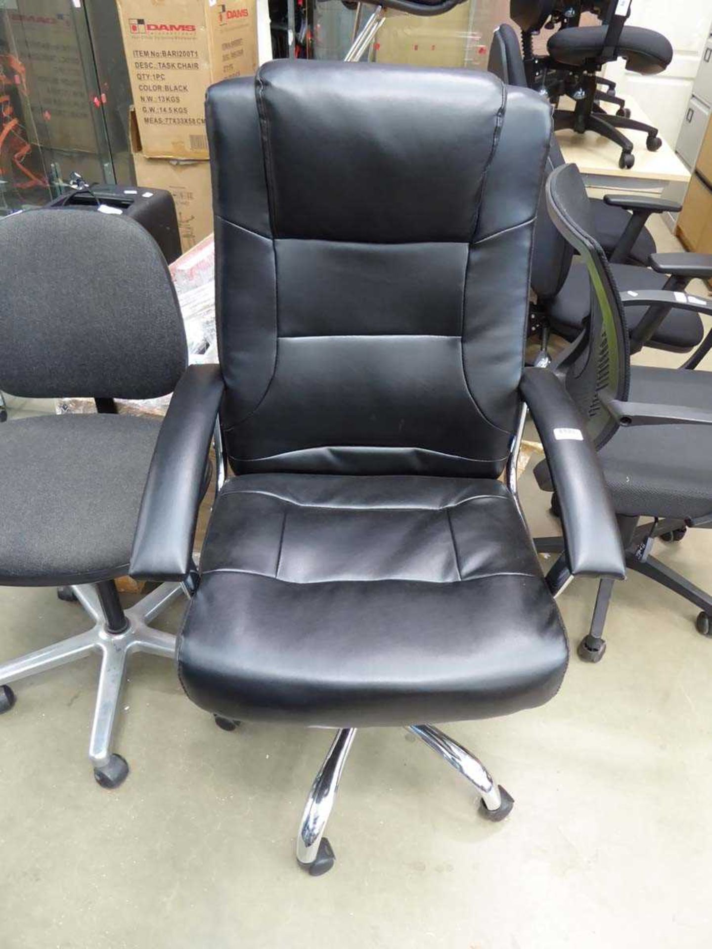High backed office swivel armchair in black on chrome base