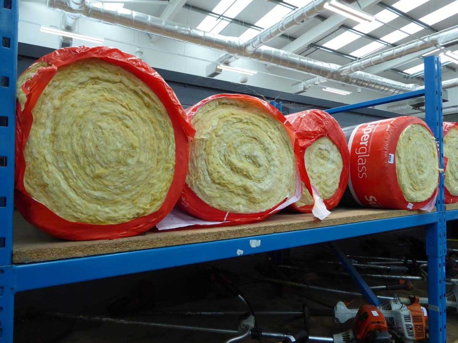 4 rolls of fibre glass insulation