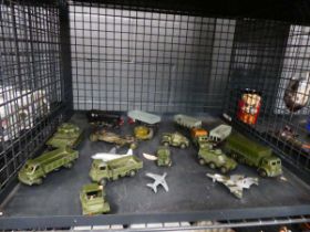 Cage containing diecast military vehicles