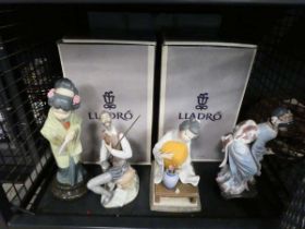 Cage containing four Lladro figures