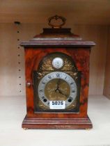 Mantel clock with brass dial and walnut case