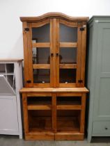 Glazed double door cabinet with cupboard base under