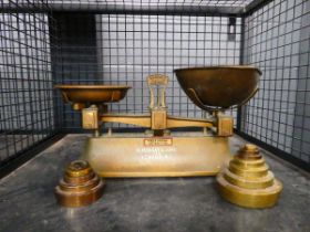 Set of kitchen scales with brass weights