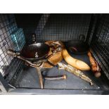 Cage containing African treen, cows horn, Zulu dancing shield, metal reclining buddha and cooking
