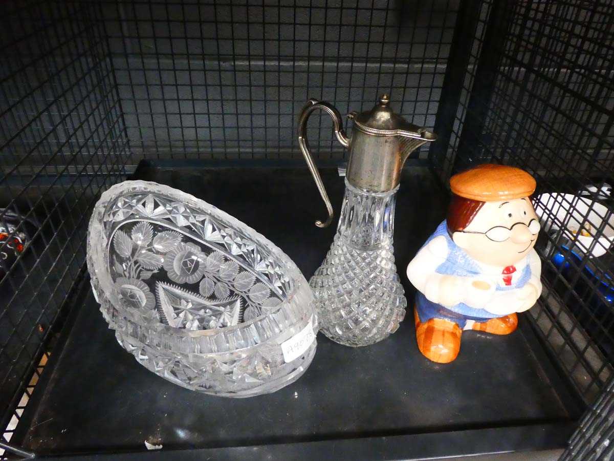 Cage containing claret jug, cut glass fruit bowl, and Tetley tea figure
